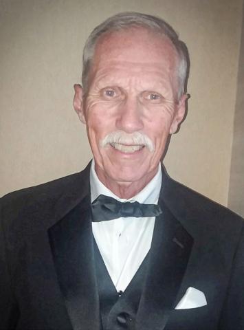 Raymond Ben Holcomb