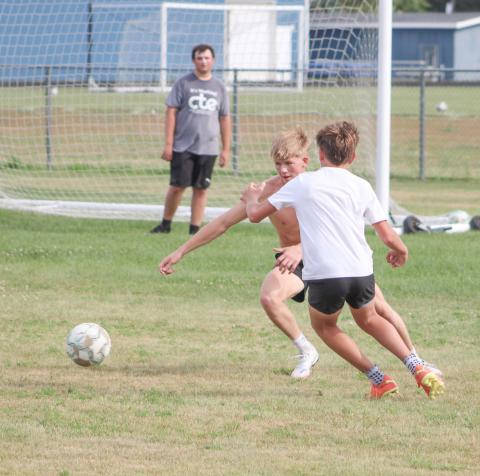 Brady Demory, one of just three seniors who have returned to the roster this season, makes a move at the first practice for the Gladwin soccer team Monday.