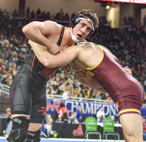 Beaverton’s Eli Roe checks the clock during the Division 4 state championship match at 175 Saturday at Ford Field. PHOTO COURTESY OF HIGH SCHOOL SPORTS SCENE