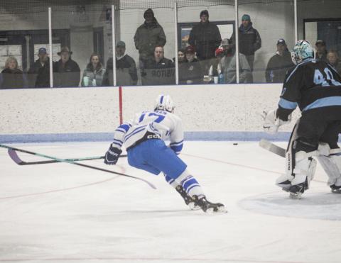 Gladwin’s Braeden Guzman makes a sharp turn in pursuit of the puck during last week’s loss to the Tri-Valley Thunder.