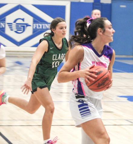 Gladwin’s Ava Gary hits the brakes and looks for an open teammate during Thursday’s loss to Clare.