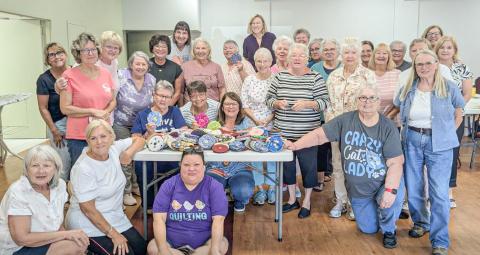 STITCHERS AND QUILTERS GATHER
