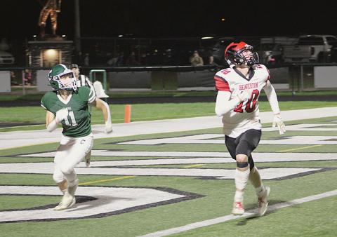 Beaverton’s Ian Roberts zeroes in on a pass during a game at Clare last season. Roberts returns to the lineup for his senior campaign Friday night at Evart.