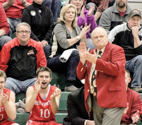 Pictured is Beaverton coach Roy Johnston leading the team in 2017.