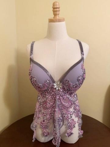 The “I am a Survivor,” donated and decorated by Cynthia Miller, a member of the Sugar Springs Stitchers, and a Detroit sports theme bra, “Lions, Tigers &amp; Wings, Oh My!,” created by Jaye Smith of Gladwin, are two of the many bras that will be auctioned off during the fundraising event.
