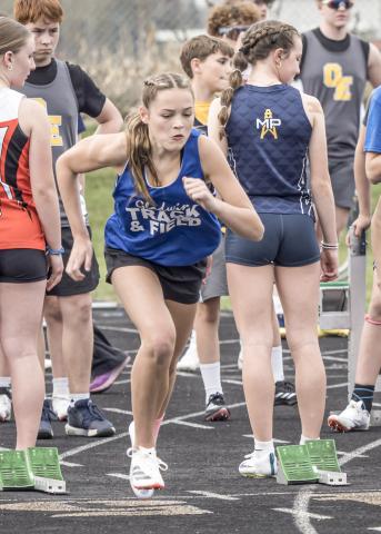 Gladwin’s Lily Hillier gets out of the blocks during Friday’s junior high track meet at Alma.