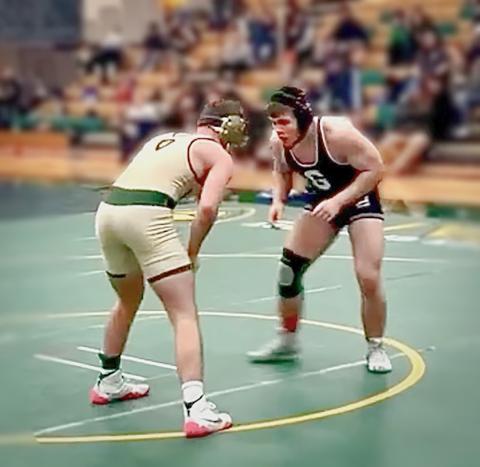 Gladwin’s Gaven Evans-Ferguson sizes up an opponent. The senior won the championship at the Traverse City West Holiday Invitational Thursday.