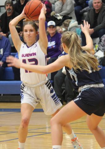 Gladwin’s Anna Seebeck is looking to make a pass during the game against Meridian.