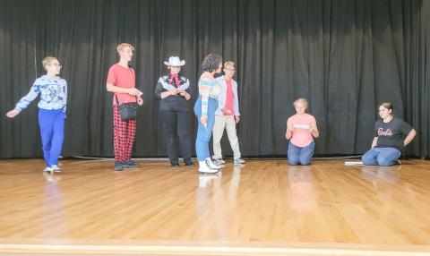 Beaverton Drama are pictured putting the finishing touches on their upcoming presentation.