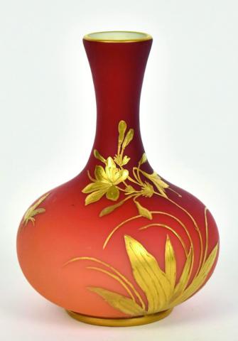 When it comes to decorations on Victorian art glass, more is always better. This vase by Thomas Webb &amp; Sons has the shaded color scheme called peachblow, a satin finish, and gold flowers and butterflies.