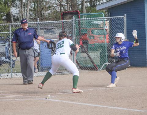 Gladwin’s Liz Winchester worked her way through a pickle and scored a run during the first inning of Thursday’s victory over Pinconning.