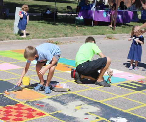 Kids Paint the Pavement near county courthouse