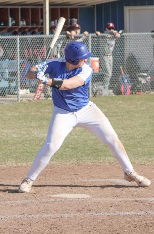 Gladwin’s Brayden Dee steps into one during a recent game.