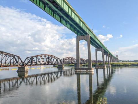The International Bridge connects Sault Ste. Marie, Ontario and Sault Ste. Marie, Michigan. SAULT STE. MARIE INTERNATIONAL BRIDGE