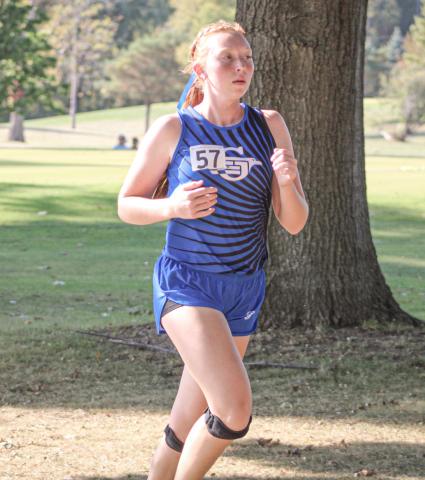 Alanis Povey competes at last week’s Jack Pine Conference jamboree. Povey was one of many Gladwin runners to post a season-best time Saturday at the Veterans Serving Veterans Invitational.