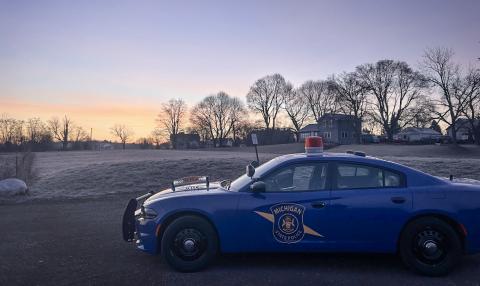 Trooper David Versin parks his patrol car in Crandell Park in Charlotte, which he said is a nighttime hangout where local teenagers sometimes go drinking.