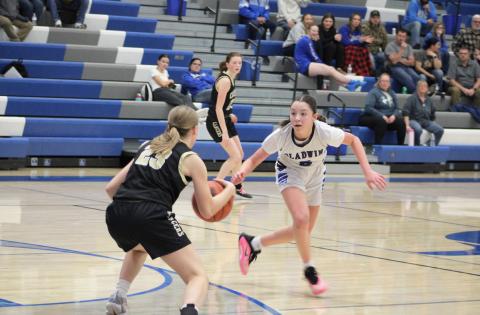 Freshman guard Liliana Gutierrez applies full-court pressure during Gladwin’s loss to visiting Bullock Creek Thursday night.