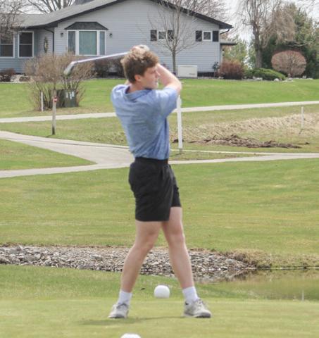 Gladwin’s Clay Newman tees off during a recent match. Newman led the Flying G’s with a 46 last Tuesday.