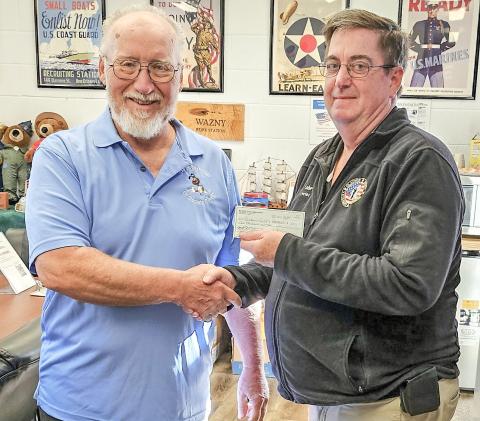 Pictured left to right: Gary Downie, Treasurer, Big Boys Club of Gladwin County, and Ken Roberts, Director of the Gladwin County Veterans Affairs Office.