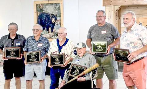 NEM Hall of Fame Baseball Inductees for 2025, are pictured left to right: Tony Windt, Gary Ozier (accepting posthumous award for Sid Wolfgang, Frank Gawlik (accepting posthumous award for Jim DeWalt), 97-year-old Don Armstrong with bat and plaque, William J. Carstens III accepting posthumous award for Cal Carstens, and Joe Pilot. PHOTO PROVIDED BY JACKIE CARSTENS