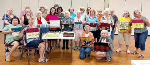 STITCHERS GATHER FOR SERVICE PROJECT