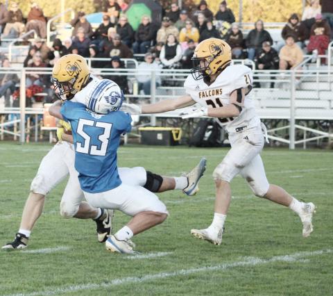 Gladwin’s Liam Pohlman makes a tackle for the loss during the first half of Thursday’s junior varsity game against Ogemaw Heights.