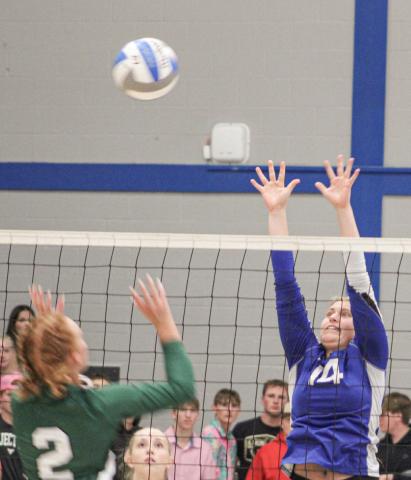 Gladwin’s Graycin Guoan goes up for the block during a recent match. The Flying G’s won twice last week and hope to close the regular season next week on a high note.