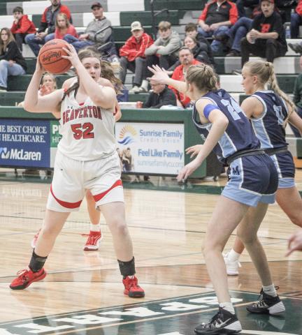 Beaverton’s Abby Northrup looks inside during last Wednesday night’s Division 3 district semifinal game against Meridian at Pinconning.