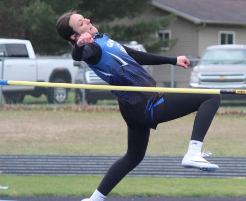 Ava Gary displays great form and concentration, placing first in the high jump.