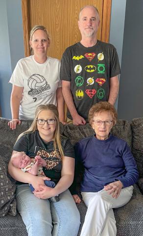 Pictured in front, Kloey McCully (holding Myles Mc-Cully), and Jacqueline Matteson, in back, Trish Day and Mike Matteson.