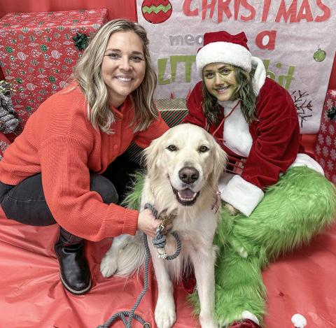 Clare-Gladwin RESD Occupational Therapist Hilary Vasher (at left), Therapy Dog Mac and Special Education teacher Katherine Schallhorn (at right).