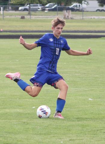 Gladwin’s Keaton Mausolf gets ready to fire a shot during a recent game. The Flying G’s dropped a 4-1 decision to Clare last week.