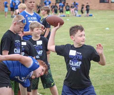 Passing drills were part of the curriculum at Gladwin’s Tim Foor Youth Football Character FUNdamentals Camp last week.