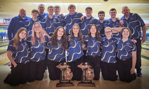 Pictured is the Gladwin High School Bowling Team, front row: Payton Sanders, Josie Pollock, Brittany Crawford, Alexis Farrow, Angelica Corlew, Ryleigh Sanders, and Madeline Crawford; back row: Coach Crawford, Noah Raymond, Coach Vantiem, Hunter Davy, Carson Hindman, Jaden Willis, Riley Banfield, Dylan Moore, Wade Roehrs, and Coach Hager.