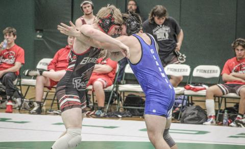 Beaverton’s Ian Krezenski and Gladwin’s Gaven Evans-Ferguson square off at 165 during last Wednesday’s dual meet at Clare. Evans-Ferguson earned a 10-5 decision to help the Flying G’s to a 58-16 victory.