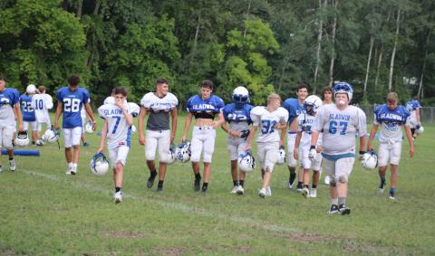 Pictured are the JV and Varsity boys working hard at practice.
