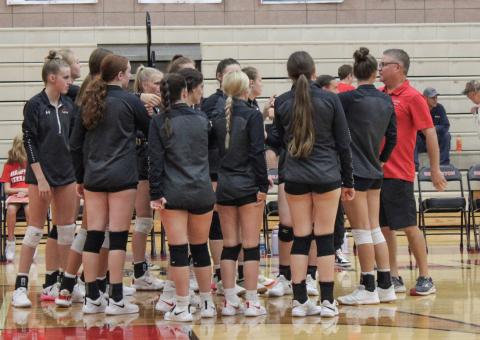 Beaverton volleyball coach boosting the girls up.