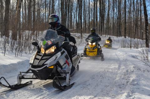 Snowmobilers enjoy a trail ride in Gogebic County.