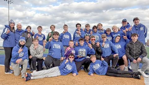 The Gladwin Junior High boys’ track team celebrates a successful trip to the Ithaca Relays last Thursday.