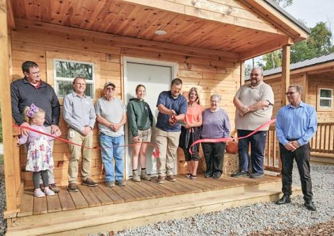 RIBBON CUTTING HELD FOR NEW CABINS