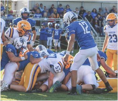 Gladwin’s defense slowed down the harrison Hornet’s offense giving Gladwin a score of 48-6.