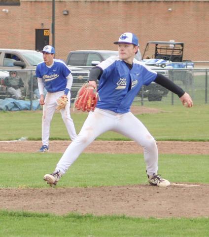 Gladwin pitcher Karter Phillips delivers a strike during Friday’s doubleheader split with visiting Remus Chippewa Hills.