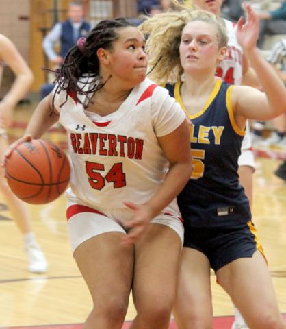 Beaverton’s Leiyah Mungin attempts to go around a Valley Lutheran defender.