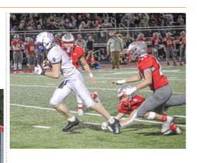 Gladwin’s Ike Wheeler breaks a tackle and heads into the clear after catching a pass during Friday night’s loss at Frankenmuth.