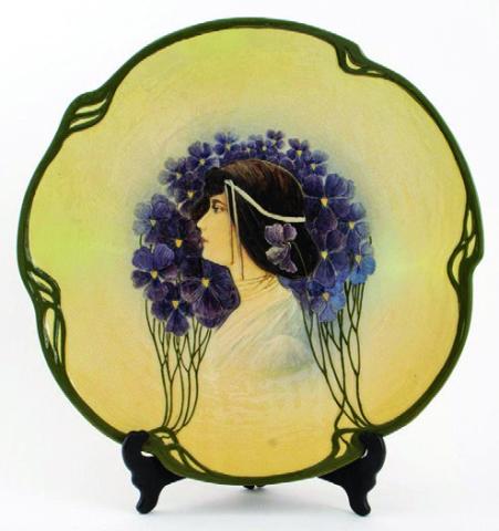 This art nouveau charger was made by the famous German ceramic company Mettlach in the Jugendstil style of the early 20th century. AUCTIONS AT SHOWPLACE