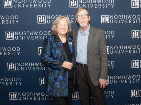 David J. Arnold is pictured with his wife, Bobbie, at the 2023 Winter Commencement at Northwood University.