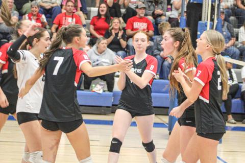 The Beaverton volleyball team was fired up for the district finals Friday night, but lost a close four-set battle with Beal City.