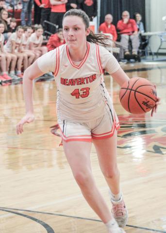 Beaverton’s Taryn Roberts heads toward the basket during Monday’s loss to Evart in the Division 3 regional semifinals.