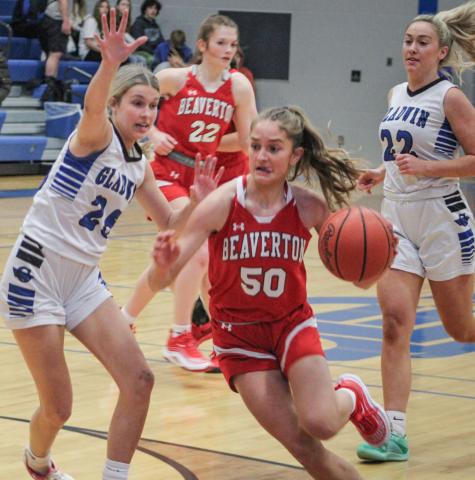 Beaverton’s Myah Hubble drives on Gladwin defender Breanna Campbell during the Flying G’s victory in the battle for the Cedar Cup last Tuesday.