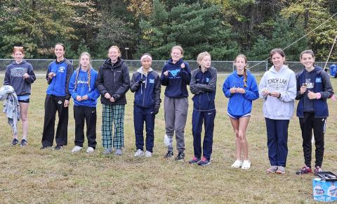 Gladwin’s girls’ cross country team tied host Meridian for the title at the Coach Cole Memorial Invitational Saturday.